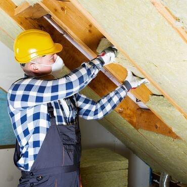 Installing attic insulation