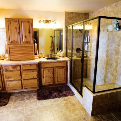 Master bath with his and her vanities, lots of storage and extra large shower.